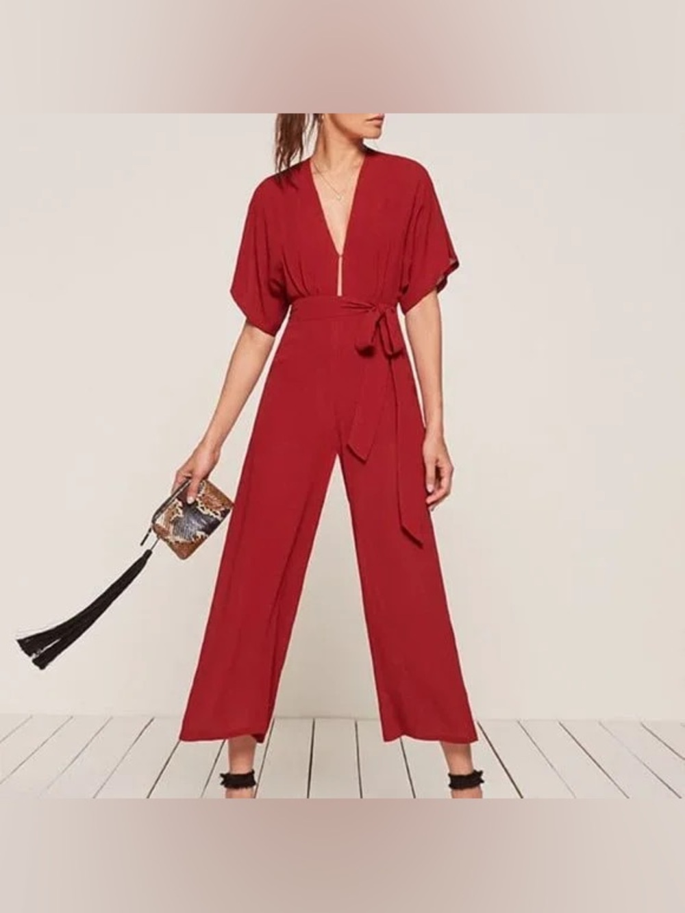 Reformation red batwing deep v-neck Swiss jumpsuit size 6